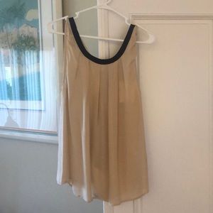 Pale pink with black trim and back tied blouse!